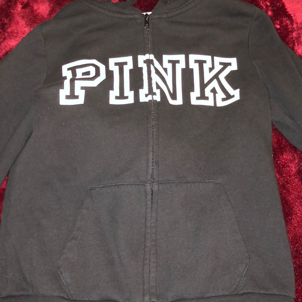 pink black zip up jacket..